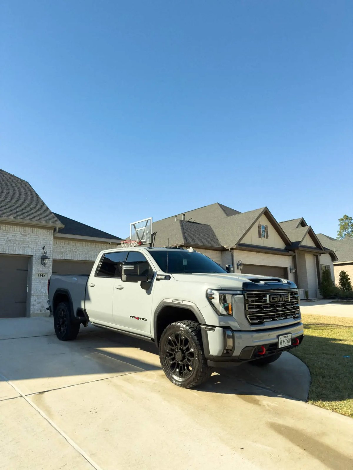 White GMC AT4 HD freshly detailed Houston TX
